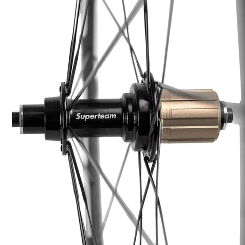 Hub and spokes detail of Toray T700 Carbon Fiber 50mm Clincher Wheelset for 700C Road Bikes with 23mm wide rim and 3K decal