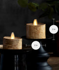 Flameless LED Tea Light Candles Set Of 2 Birch And Pearl Ivory Real Wax Look on black stands, remote timer battery operated