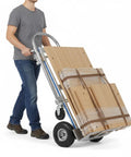 3 In 1 Folding Hand Truck Dolly Cart With Wheels Up To 550 Lbs Heavy Duty Aluminum Frame Includes Stair Climbing Four Wheel Incline And Flatbed Modes No Tools Needed carrying boxed panels in stair-climbing mode