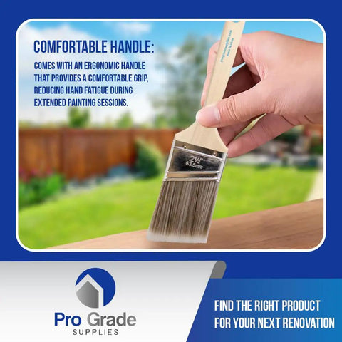 A hand holding a 12 Pack 2.5 Inch Angle Paint Brush with Durable Wood Handle showing Comfortable Grip.
