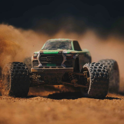 1/18 Scale Granite GROM Mega 380 Brushed 4x4 Monster Truck RTR Ready To Run With Battery And Charger Green kicks up dirt