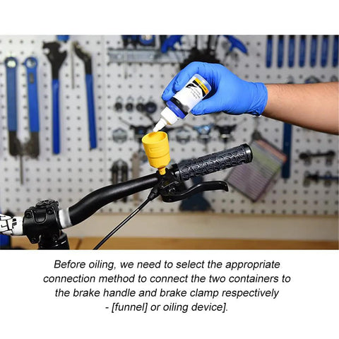 All In One Bike Hydraulic Disc Brake Bleed Kit With 12 Oil Filling Joints And Transferable Funnels in use on bike handlebar