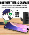 On The Go Pocket Sized Soldering Iron Pen With Built In USB C Cable charging via smartphone on wooden table background