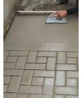 Person smoothing concrete using walkway concrete path molds 23.6 by 11.8 inches reusable DIY stepping stone paver set for garden patio.