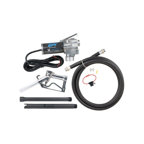 M-150 Series No Nonsense 12V Fuel Transfer Pump Kit With Manual Shutoff Unleaded Nozzle, 15 GPM, Includes Hose With Static Wire, Telescoping Suction Pipe, Tank Adapter, Fuse Assembly And Power Cord. Kit parts on white background.