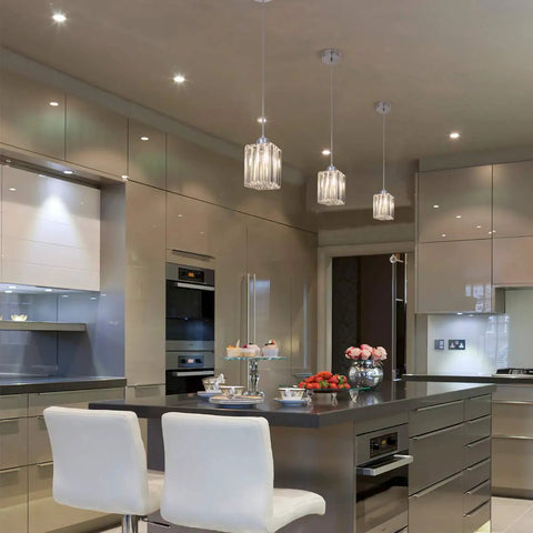 Modern kitchen with Crystal Cuboid Pendant Lights Set Of 3 In Polished Chrome Dimmable Mini Pendant Fixtures over island.