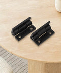 Black FABULETTA hinges placed on table, Robust Zinc Alloy Adjustable Torque Damping Hinges For Cabinets Doors Windows And Industrial Equipment