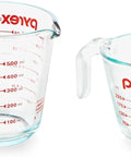 Two Piece Glass Measuring Cups Set With 1 Cup And 2 Cup Sizes, Pyrex glass with red markings, showing ounces and milliliters.