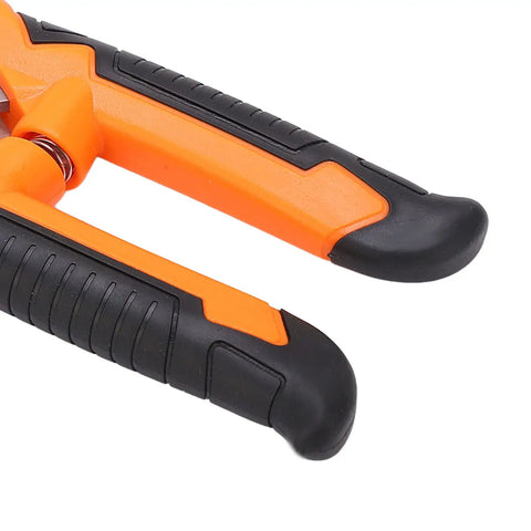Ergonomic grip of Wire Stripper And Cutter Tool With Curved Blade And Crimping Design For Electronics Repair And Cable Maintenance Power Cord Cutting And DIY Projects Pro Grade Stainless Steel HRC55 Precision Stripping Holes And Ergonomic Grip in orange and black