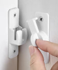 White Aluminum Alloy Gate Lock Featuring Dual Angle Design For Rugged Barn Door Latch Security Smooth 90 And 180 Degree Pivoting close-up on installation.