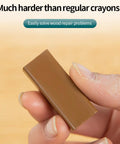 Close-up of a brown wax stick from the Heat Melt Wax Repair Stick For Wood Floors And Furniture, 11 Color Quick Fix Set.