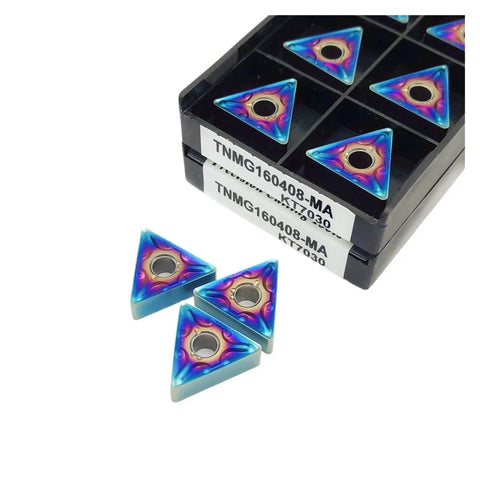 Get These Awesome Indexable Carbide Lathe Tools With Ten Tough TNMG Inserts For Precision Turning On Steel Or Cast Iron Super Hard Knives That Make Your Machining Jobs Epic And Smooth Like A Dream. Close-up of TNMG inserts in a tray.