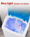 Compact Portable Washer Machine With Timer Dial Single Tub Laundry Cycle Built For Apartments Rv Dorms Easy Spin Dry 6kg Capacity Lightweight Red Shell showing blue light and washing clothes.