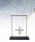 Rolling Pendulum Interactive Toy For STEM Education Reusable Physics Demonstration Kit on a black base for classroom use