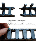 39.4 Inch Nylon PA66 Cable Drag Chain Carrier Pro Grade R28 18x37mm Inner, 23.7x47.7mm Outer Open Type For CNC Routers, Mills, And 3D Printers With Extra Ends, Screws, And Screwdriver, black PA66 chain being split with screwdriver