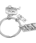 Rad Retro Travel Themed Zinc Alloy Keychain For RV Owners And Pilots Lightweight Yet Sturdy Camper Accessory with charm details.