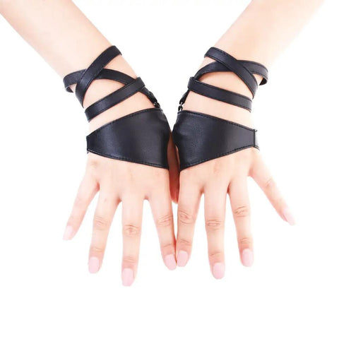 Dope Women Fingerless Gloves Crafted From Supple Faux Pu Leather For Nightouts And Punk Scenes Ultra Flexible Half Palm Wrist Cuff In Classic Matte Black Finish worn on hands with crossed straps.