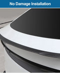 Drop In Badass Aero Upgrade For The Tesla Model Y Juniper Rear Spoiler Trunk Lip Tail Wing No Drill Hassle Seamless Factory Fit close-up view of the carbon fiber lip on the trunk