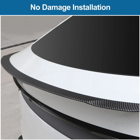 Drop In Badass Aero Upgrade For The Tesla Model Y Juniper Rear Spoiler Trunk Lip Tail Wing No Drill Hassle Seamless Factory Fit close-up view of the carbon fiber lip on the trunk
