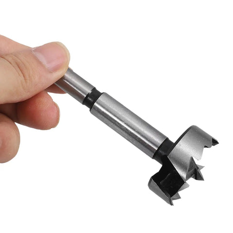 Close-up of a steel Forstner bit from the Knockout 5 Piece Forstner Bit Set For Woodworking for clean wood drilling.