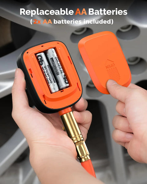 ETENWOLF T600 digital tire pressure gauge, orange housing opened to show AA batteries inside.
