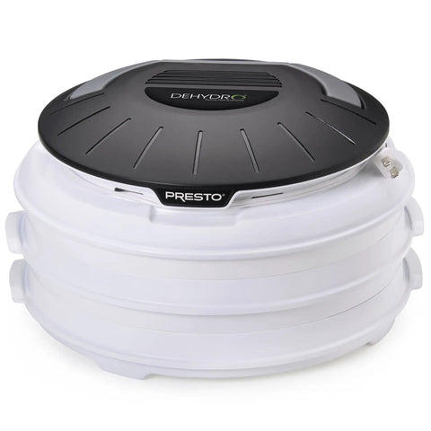 Electric Food Dehydrator With Four Stackable Trays And Top Mounted Fan Perfect For Kickin Homemade Beef Jerky Fresh Fruit Snazzy Veggies And No Junk Pet Treats Straight Up Healthy Snacking Done Right, compact design with black top.