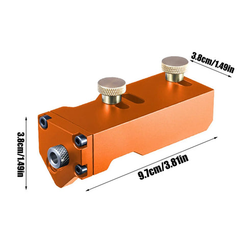 Precision Aluminum Extrusion Drill Jig With Dead On Vertical Alignment, orange jig measuring 9.7cm x 3.8cm for accurate t slot hole alignment.
