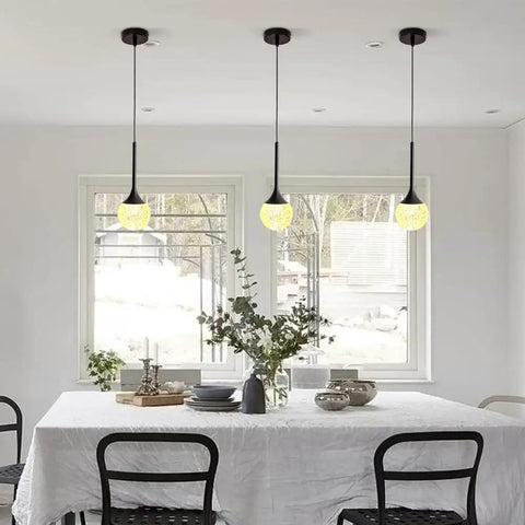 RGB LED Pendant Light With Remote Control, Matte Black Teardrop Chandelier With Bubble Crystal above dining table