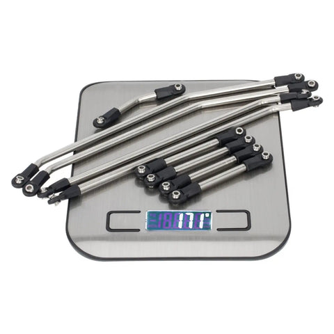 Optional stainless links for Ultra Light Carbon Fiber LCG Chassis Kit For 1/10 RC Crawler Rigs displayed on a digital scale