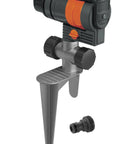 ZoomMaxx Adjustable Oscillating Sprinkler On Metal Step Spike with Quick Connects for Large Lawns displayed on white background