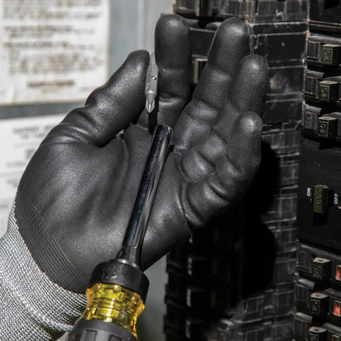 Person using Ratcheting Multi-Bit Screwdriver 15-In-1 With Phillips Slotted Square Torx And Combo Bits near a circuit breaker panel