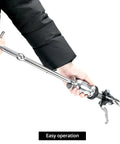 Side view of a stainless steel slide hammer gear puller with long handle and adjustable jaws held by a gloved hand