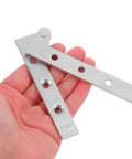 Hand holding 4Pcs Stainless Steel Hidden Door Pivot Hinges for Cabinets and Doors With Thickened Design, showcasing polished core.