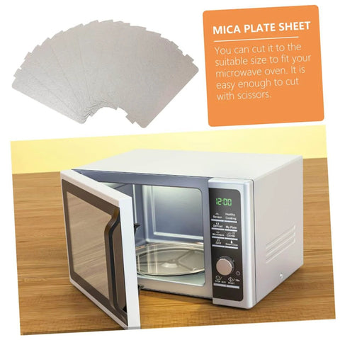 Six Pack Microwave Heat Insulation Pads Mica Sheet Covers for waveguide crisper liners shown next to a microwave oven