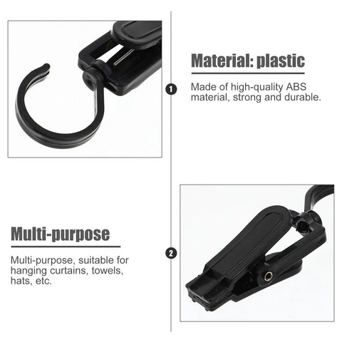Close-up of black rotatable plastic curtain clips with swivel hooks showing durable ABS material and multi-purpose use.
