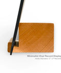 Legit Solid Hardwood Turntable Stand For LP Records And Album Jackets To Show Off Your Fresh Vinyl Collection While Spinning Tracks Without Messing Up Your Smooth Lounge Or Desk Area Setup, angled view of wooden display holding vinyl.
