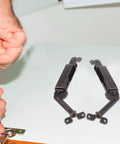 Heavy Duty Spring Lid Stay Hinges With Sweet Antique Red Iron Finish Tough As Nails Cabinet Hardware being installed on wood.