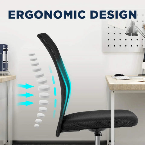 Side view of Go-To Ergonomic Mesh Office Chair With Lumbar Support Mid Back Armless Desk Chair in black next to desk.