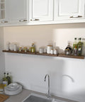 15 Inch Floating Shelves Set Of 4 With Hidden Brackets Rustic Brown Wall Mounted Shelves in kitchen displaying jars and bottles
