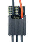 Close-up of Dope 50A Mini FSESC 4.20 Electric Skateboard Speed Controller with aluminum heat sink and wires visible.