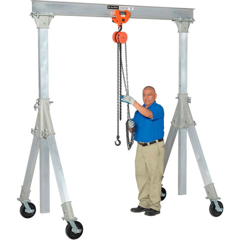 Portable Adjustable Height Aluminum Gantry Crane Lightweight Workshop Hoist With No Fuss Setup Easy Lift Gear Without Breakin Sweat For Tight Garage Bays, with user demonstrating hoist operation.