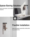 Ultra Handy Wall Key Holder With 4 Hooks And Dual Adhesive Tapes, mounted on wall, used for hanging items, black finish