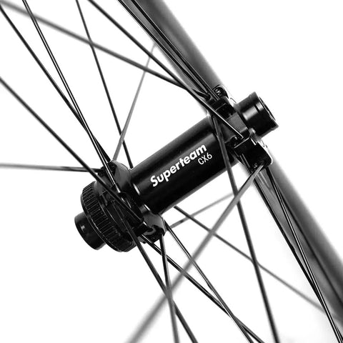 Close-up of hub on Carbon Disc Wheelset with Wave Rim 50CU 25 CC Thru Axle 12x100 for road and gravel bikes.
