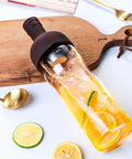 Eight Hundred Milliliter Glass Cold Brew And Iced Coffee Drip Maker With Splash Drip Proof Lid, featuring iced tea and lemon slices.