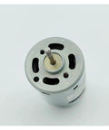 Close-up of Beefy Little 380 DC Motor For DIY Projects 6V To 18V 12V 11000 RPM with mounting holes and shaft, side view.