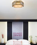 Gold Crystal Flush Mount Ceiling Light With 4 Lights, Modern Brass Frame, Flower Drum Design in elegant bedroom setting.