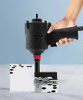 Pro Grade 8mm Pneumatic Hole Puncher in use, punching precise 0.08 inch holes in metal sheet, held by hand, showcasing durable design.