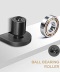 Sliding Barn Door Bottom Floor Guide With Ball Bearing Rollers, black finish, close-up of adjustable stay wheel and roller