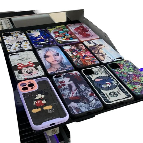 Professional Industrial Flatbed Inkjet Printer Delivers Crisp Serial Number Labeling With Plug And Play Ease For Chemical Packaging No Sweat Smudgeproof Auto Coding Rig showcasing colorful phone cases.