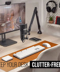 Modern desk setup with PSA1+ Pro Studio Desk Boom Arm with spring damping, cable management, and 360 degree rotation in black.